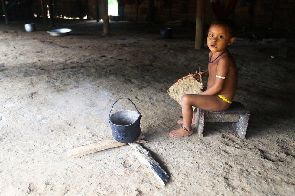 Boy in hut