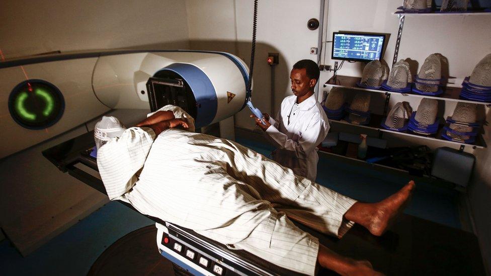 Person wey dey do radiotherapy.