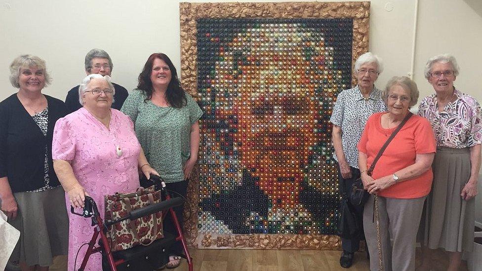 Members of the Wallace House craft group with their portrait