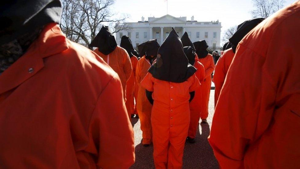 Protesters from Amnesty International USA and other organisations rally outside the White House to demand the closure of Guantanamo Bay (11 January 2016)