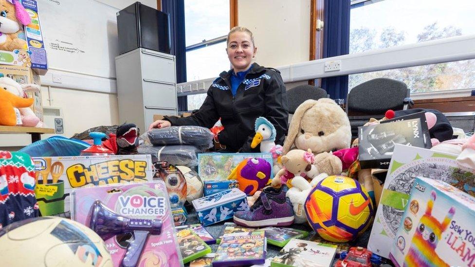 PCSO Kate Sephton surrounded by the gifts