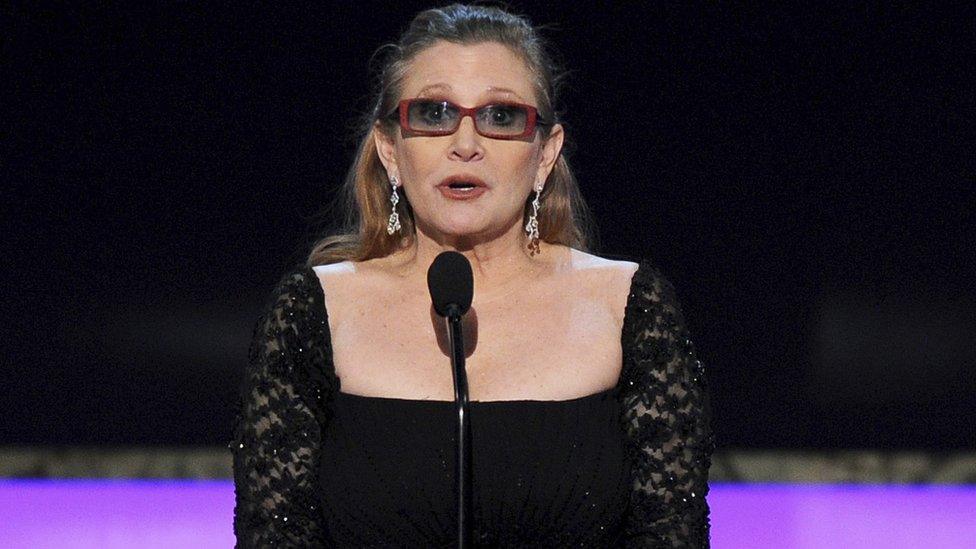 Carrie Fisher presents the life achievement award at the 21st annual Screen Actors Guild Awards at the Shrine Auditorium in Los Angeles. Jan 25, 2015