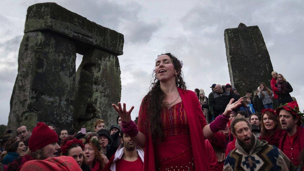 Woman celebrates winter solstice