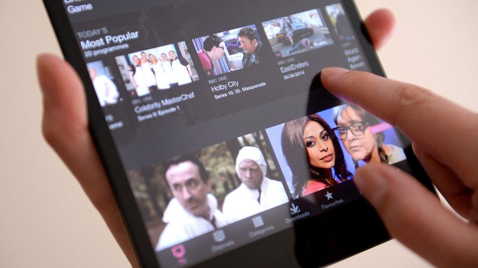 Person using BBC iPlayer on a tablet device