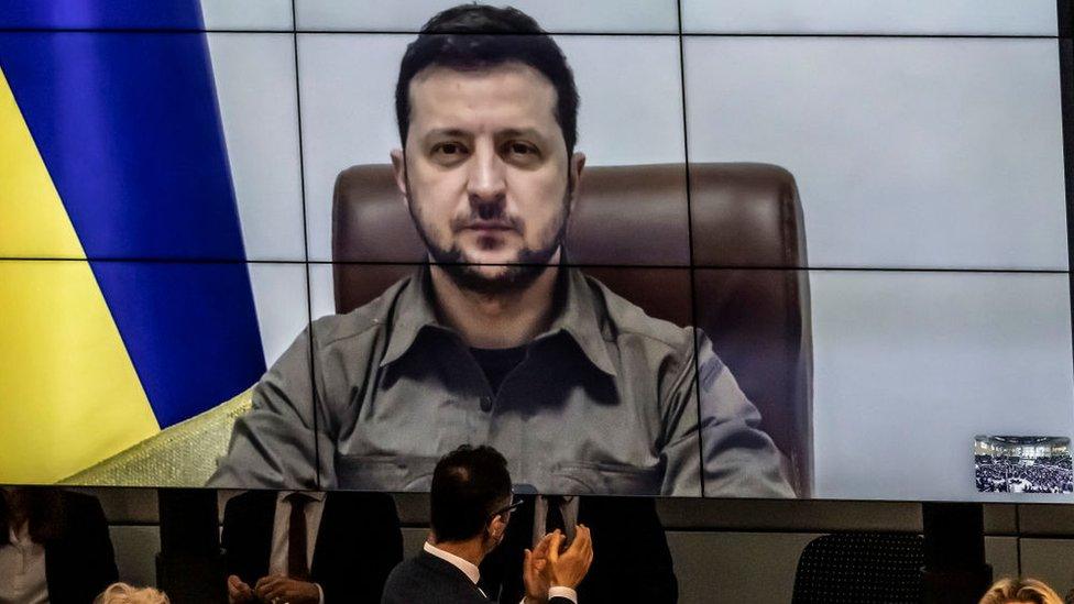 Ukrainian President Volodymyr Zelensky addresses the Bundestag via live video from the embattled city of Kyiv on March 17, 2022 in Berlin, Germany