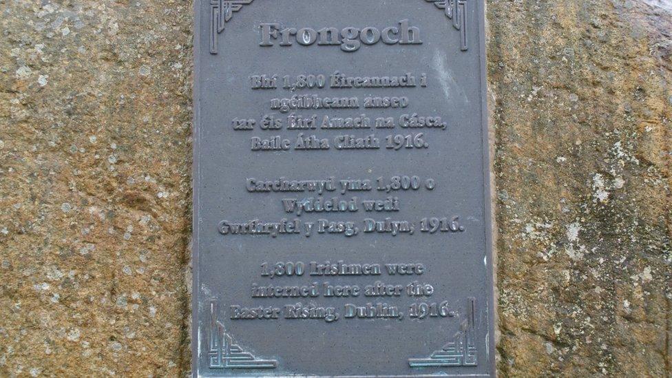 A plaque in the village to mark the camp - inscribed in Irish, Welsh and English