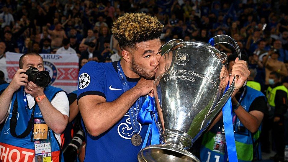 Reece James kissing the Champions League trophy