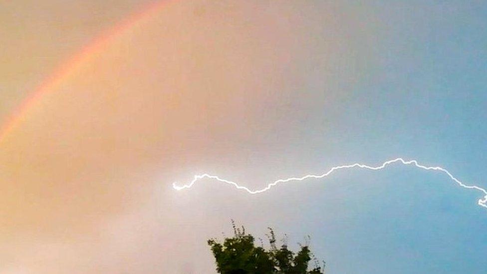 Rainbow and lightning