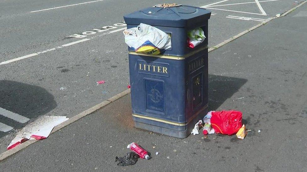 Bin overflowing with litter