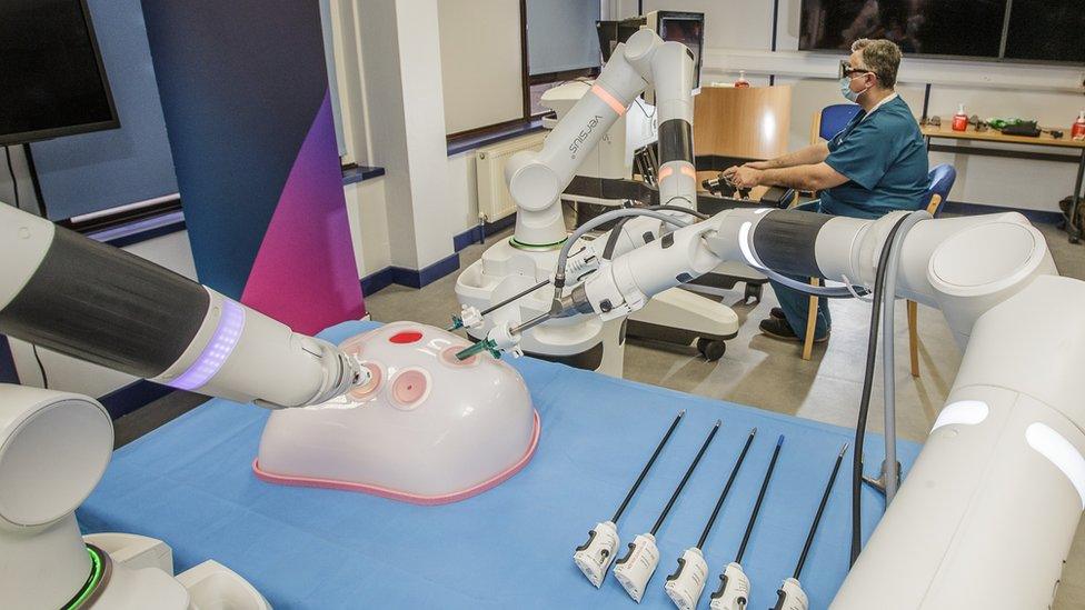 The surgical robot operates on a dummy during training at Ysbyty Gwynedd in Bangor.