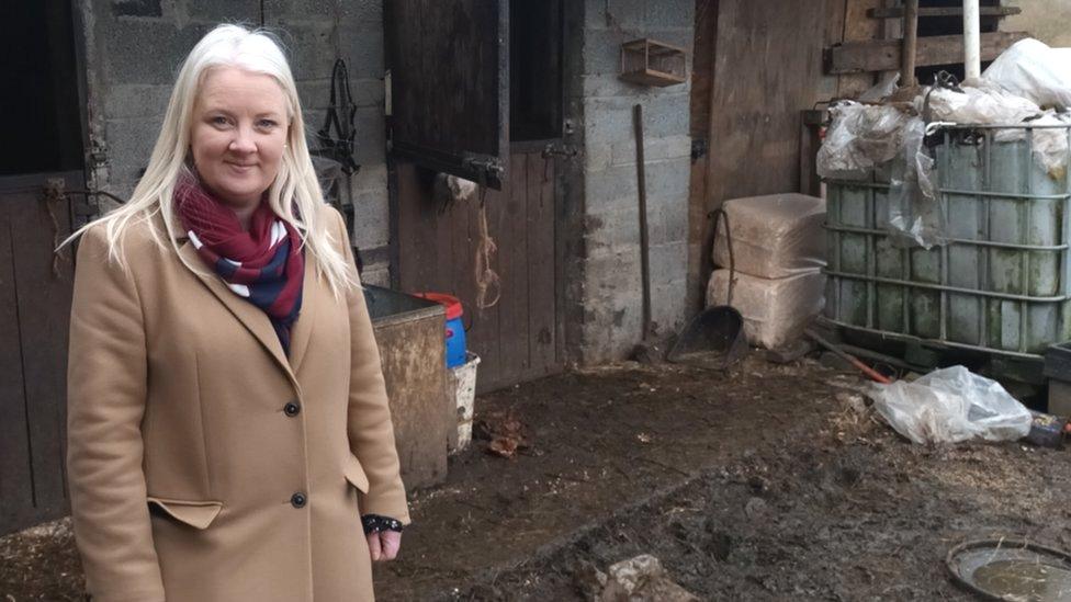 Councillor Sarah Kiely outside a stable in Moyross