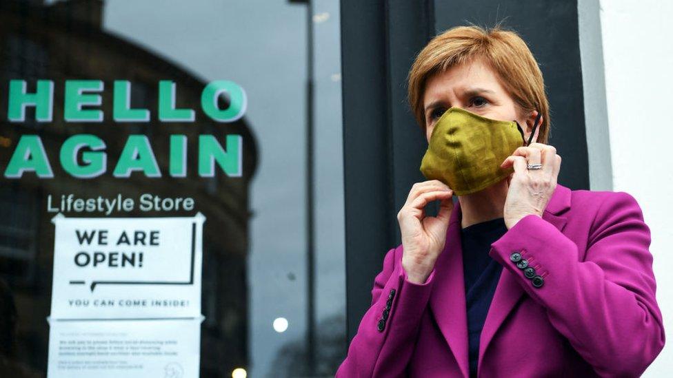 Nicola Sturgeon outside a shop