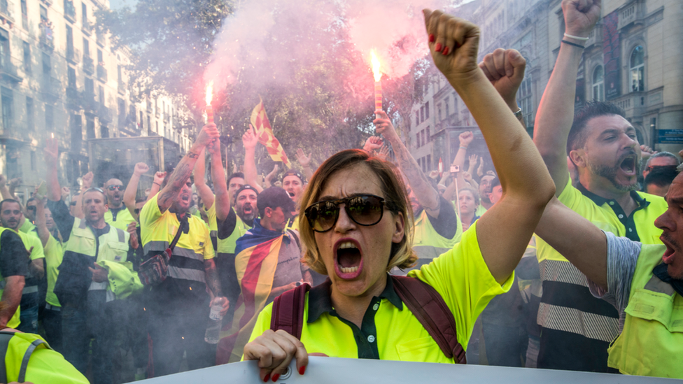 Demonstrators on the streets of Barcelona protest against police violence following the Catalan independence referendum, 3 October 2017