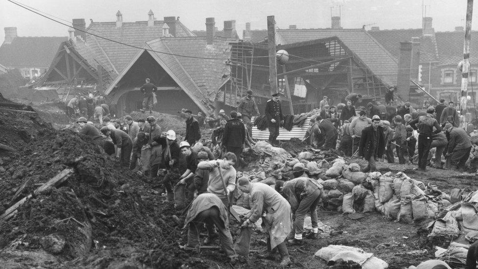 Rescue workers at the scene of the Aberfan disaster the following day