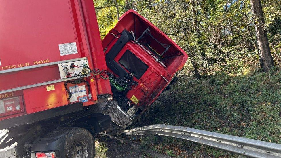 The jack-knifed lorry