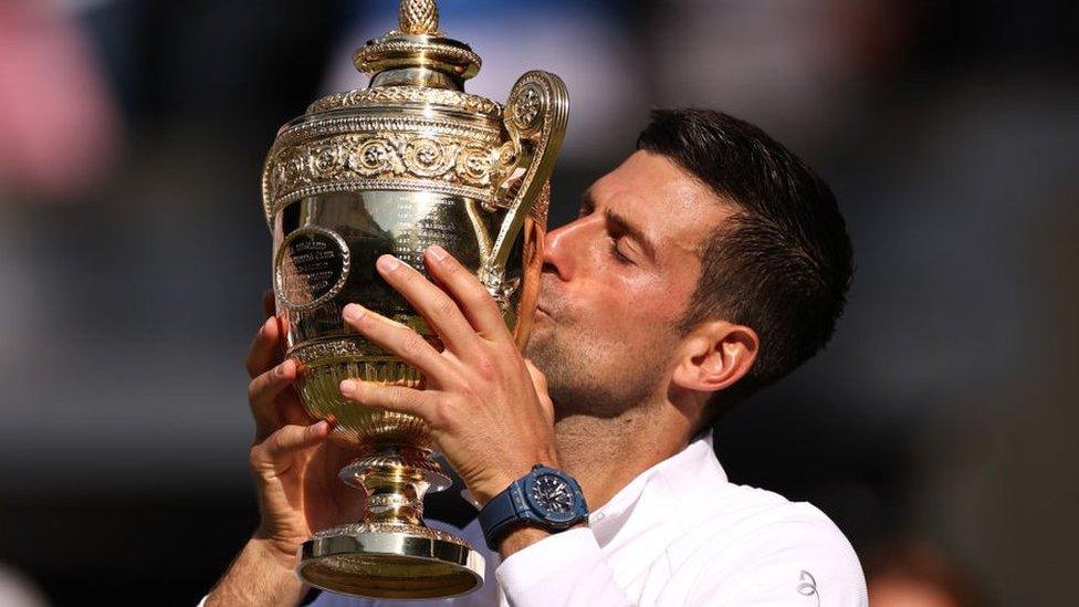 novak djokovic with trophy