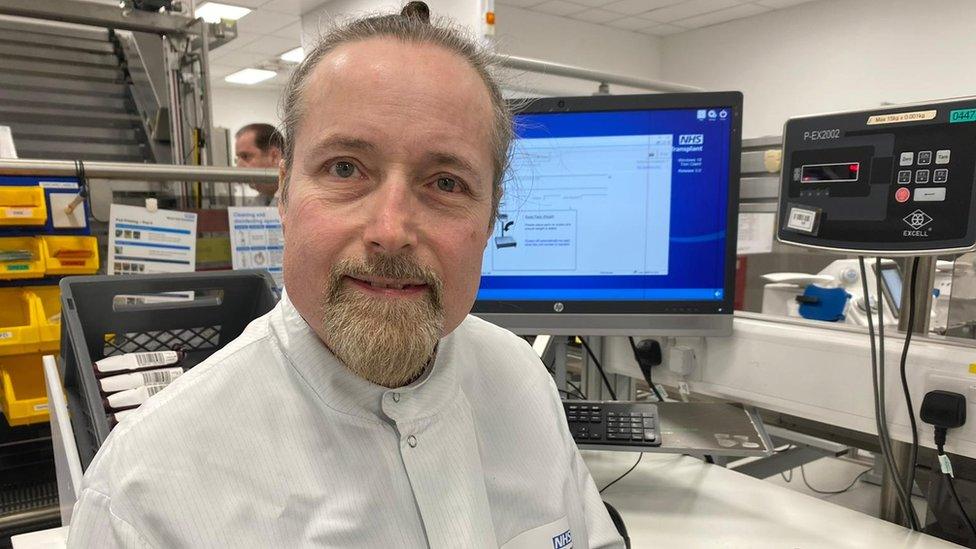 NHS blood centre worker Phil Brown at his desk