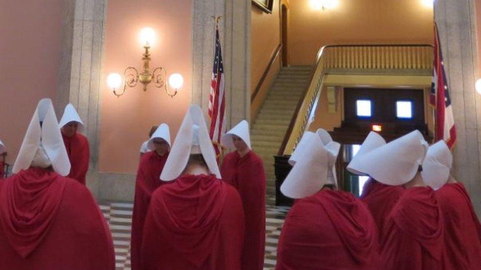 Handsmaid Tale protesters in Ohio Statehouse rotunda (13 June 2017)