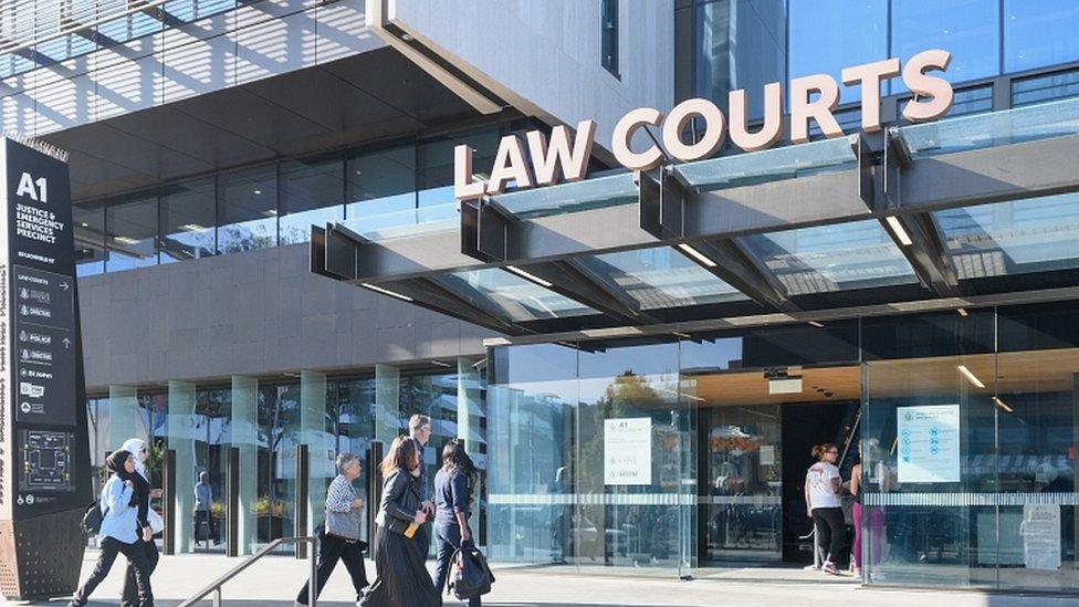 Members of the Muslim community arrive at Christchurch High Court to attend the case review hearing of Brenton Harrison Tarrant on February 24, 2020 in Christchurch, New Zealand