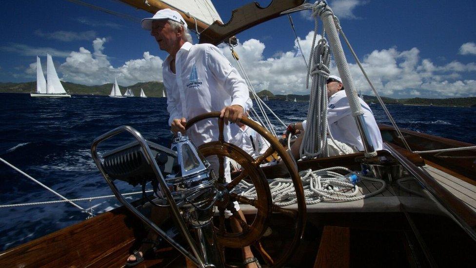 Gerald Rainier at the helm of the Mary Rose