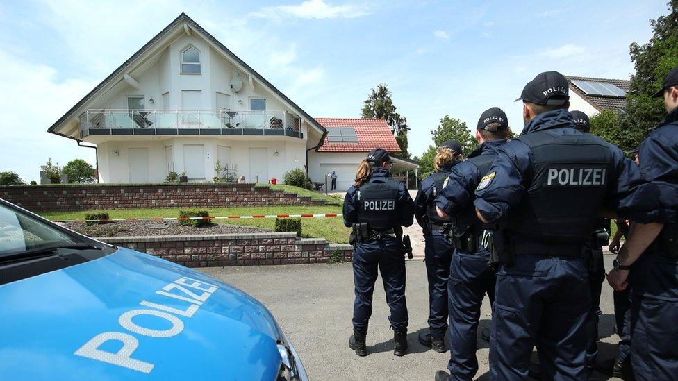 German police officers arrive at the house of District President of Kassel Walter Luebcke, who was found dead, to search neighbouring properties in Wolfhagen-Istha near Kassel, Germany, June 3, 2019.