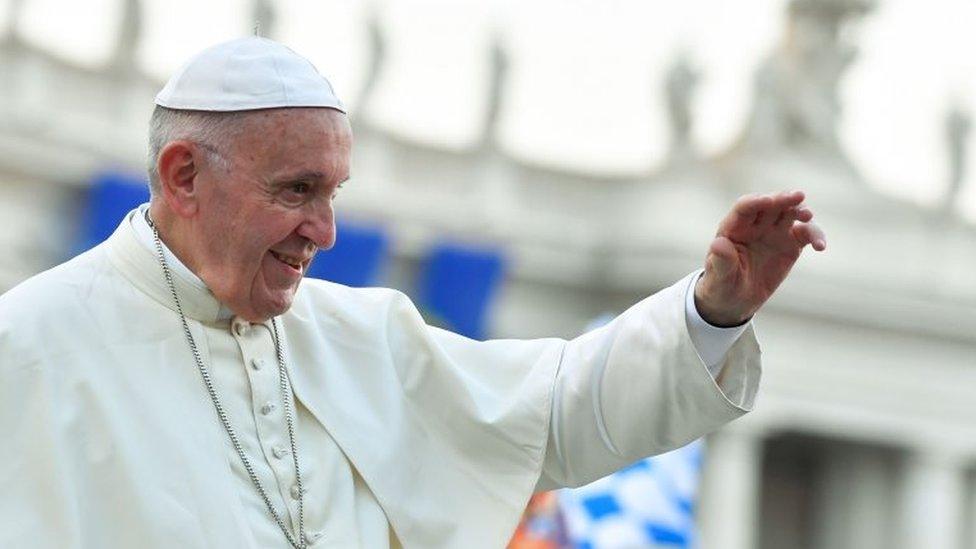 Pope waves to crowd