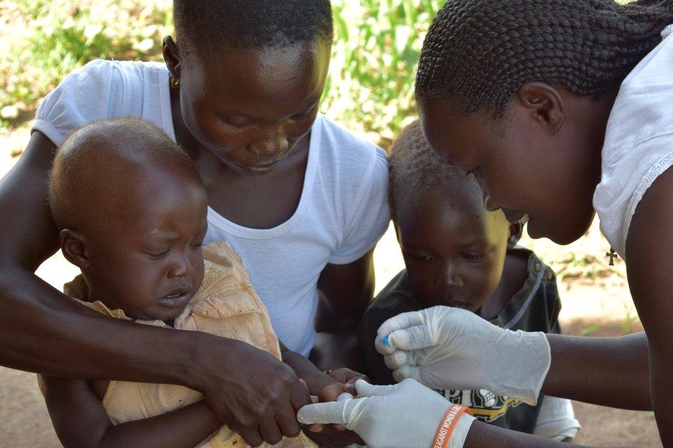 Josephine does a blood test for malaria