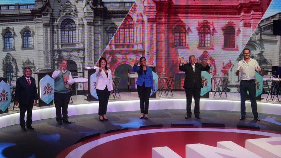 Presidential candidates (L-R) Alberto Beingolea, Marco Arana, Keiko Fujimori, Veronika Mendoza, Cesar Acuna and George Forsyth greet during the first day of the three debates organized by the National Elections Jury in Lima, Peru, 29 March 2021.