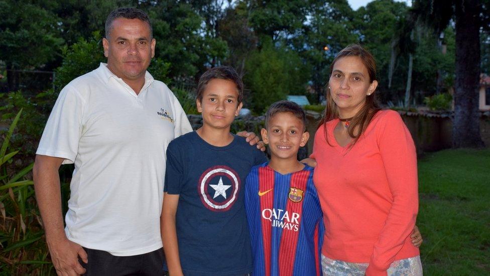 The Páez Yepez family pose for a photo in Merida