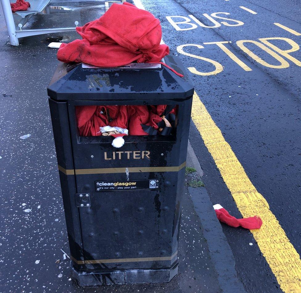 Discarded Santa suits