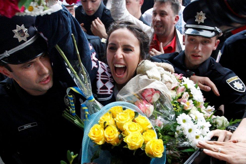 Crimean Tatar singer Susana Jamaladinova, known as Jamala, who won the Eurovision Song Contest, reacts during a welcoming ceremony upon her arrival at Boryspil International Airport outside Kiev, Ukraine, on May 15, 2016.