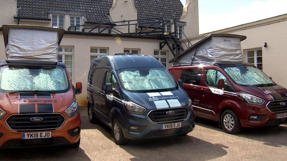 Staff are sharing three campervans