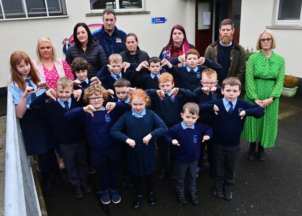 Pupils parents and staff at Kingsmills Primary School