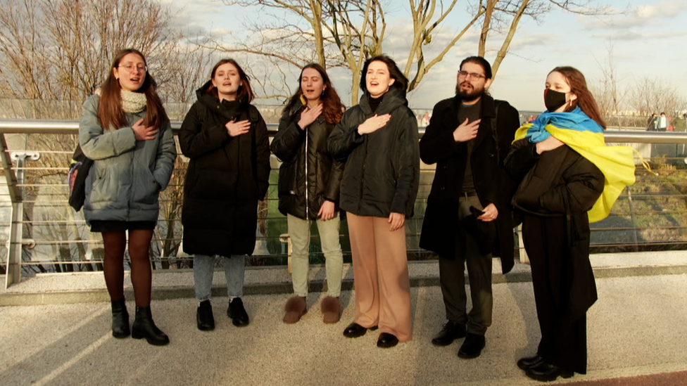 Students recite the national anthem in Kyiv, Ukraine