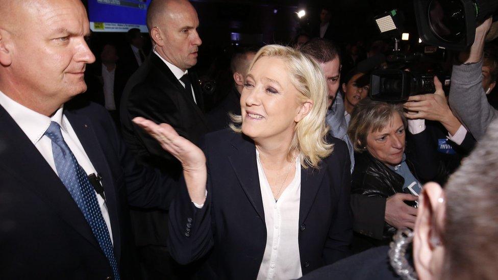 Marine Le Pen waves to supporters. 6 Dec 2015