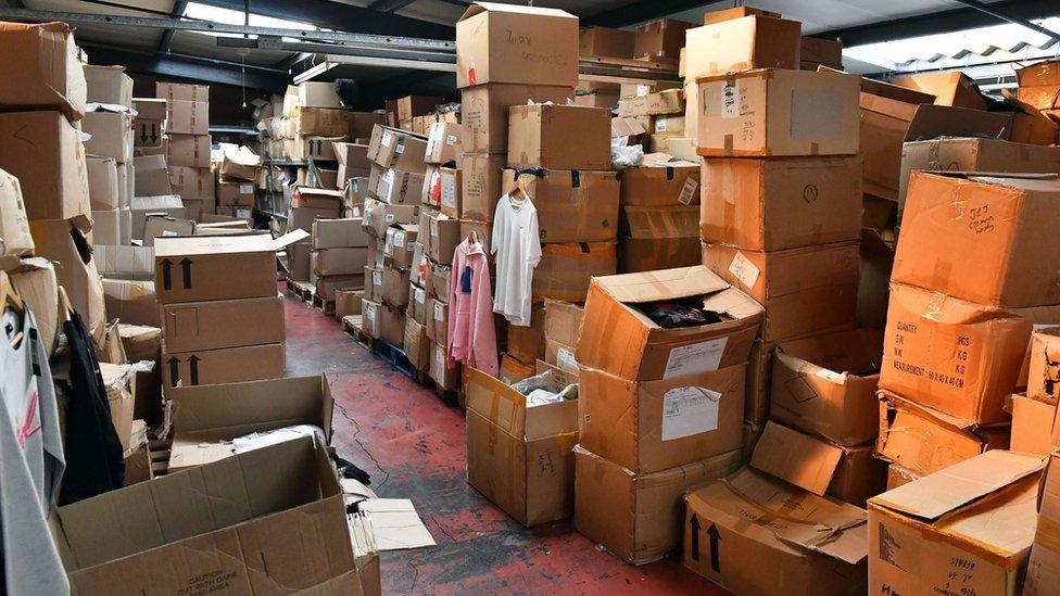 Boxes of counterfeited items inside warehouse