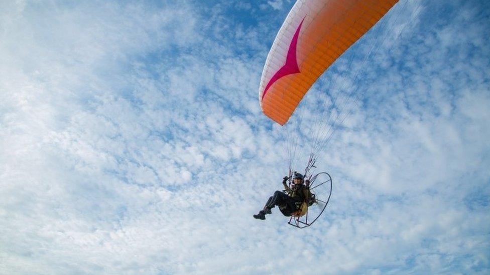 Sacha Dench with a parachute wing