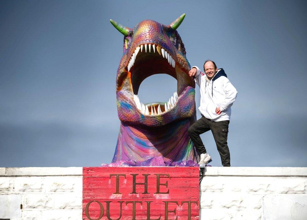 Jake Westlake, with the dinosaur head which he painted