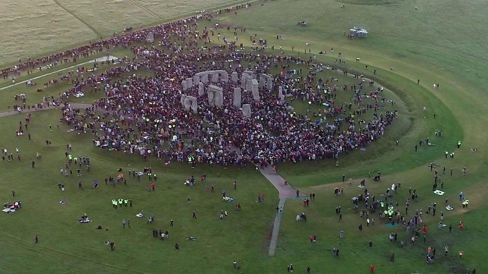 Thousands of people greeted the sunrise at Stonehenge on summer solstice.