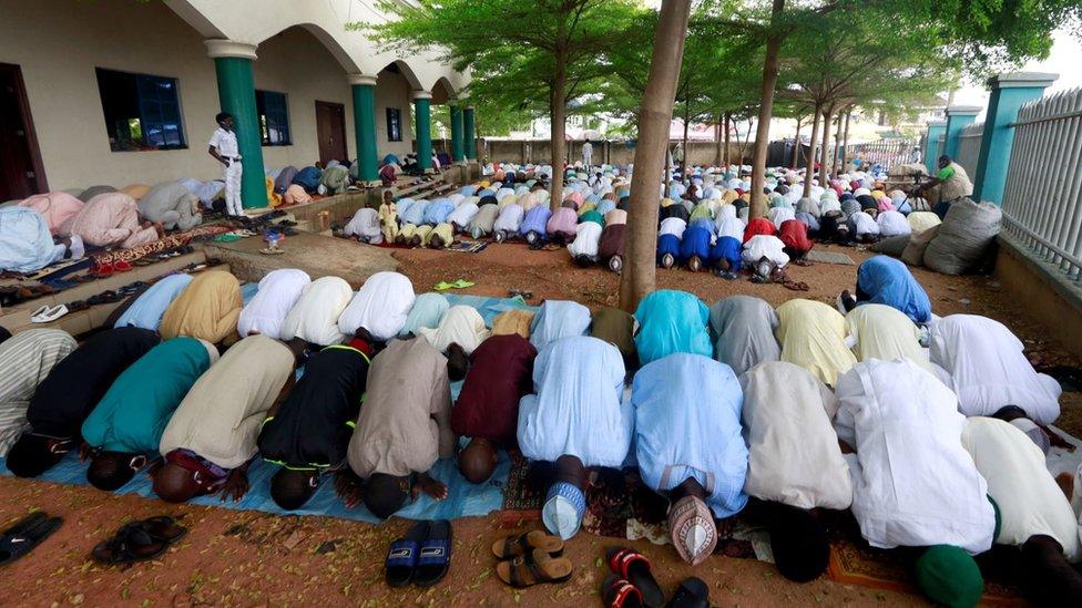 Muslims in Nigeria perform Eid prayer after the lockdown following the global outbreak of coronavirus disease (COVID-19) in Nasarawa, Nigeria May 24, 2020.