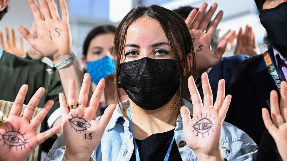 Youth Climate Activists protest against fossil fuels outside the plenary rooms at COP26 as high-level negotiations continue among world governments on November 10, 2021 in Glasgow, Scotland. As World Leaders meet to discuss climate change at the COP26 Summit