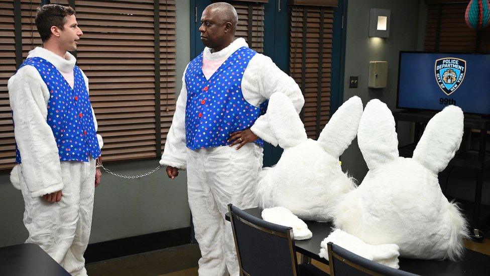 BROOKLYN NINE-NINE -- "Valloweaster" Episode 711 -- Pictured: (l-r) Andy Samberg as Jake Peralta, Andre Braugher as Ray Holt