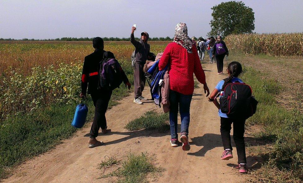 People close to the border crossing at Sid, leading from Serbia to Croatia