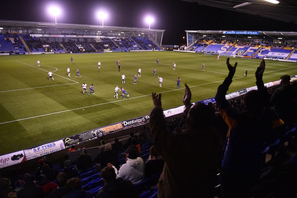 General view inside the stadium as fans show their support from the stands in the match between Shrewsbury Town and Accrington Stanley