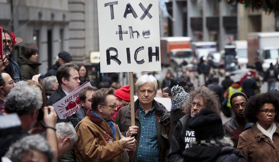 Demonstrators in Wall Street, New York city, 19 December 2017