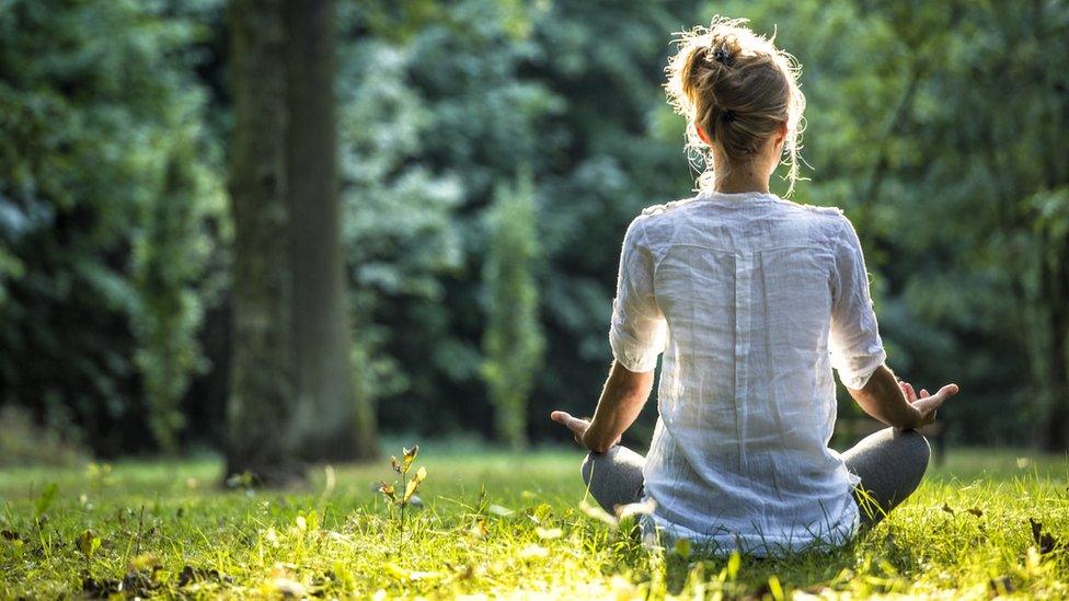 A woman meditating