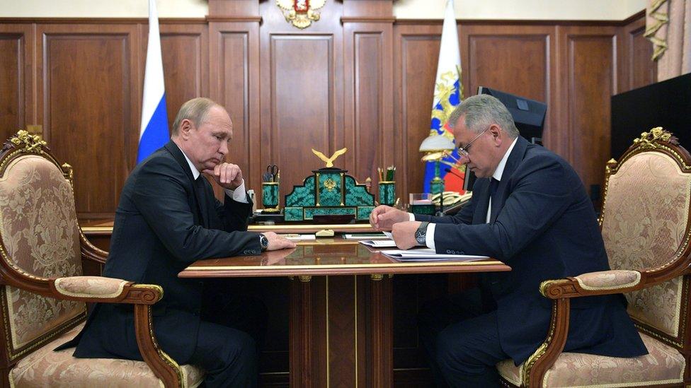 Russian President Vladimir Putin and Defence Minister Sergei Shoigu