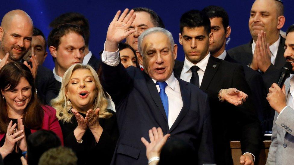 Prime Minister Benjamin Netanyahu celebrates after the exit polls are published for Israel's general election (4 March 2020)