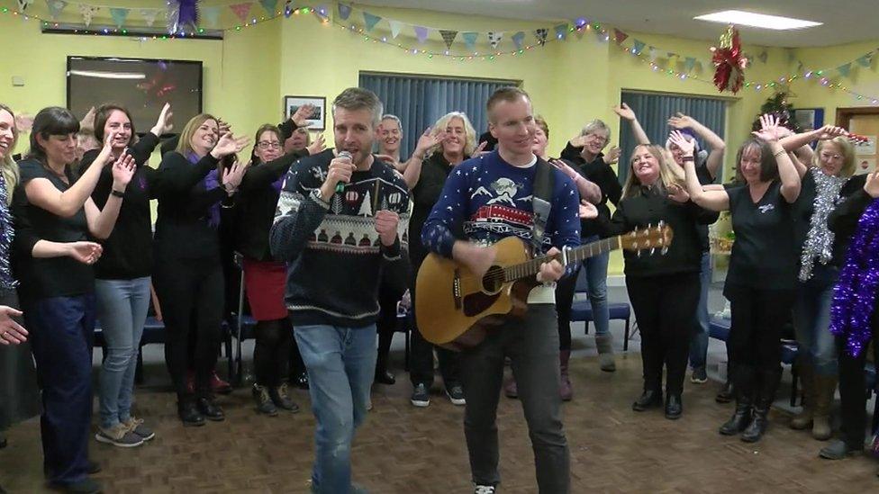 Lt Cdr Phil Clark (R) and Lt Cdr Dave Emery with the Culdrose Military Wives Choir