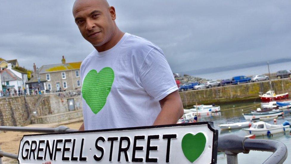man holding sign